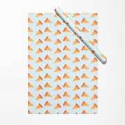 Roll of paper with pizza slice pattern on a light blue background