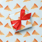 Gift box with a red ribbon on a background with pizza slice pattern
