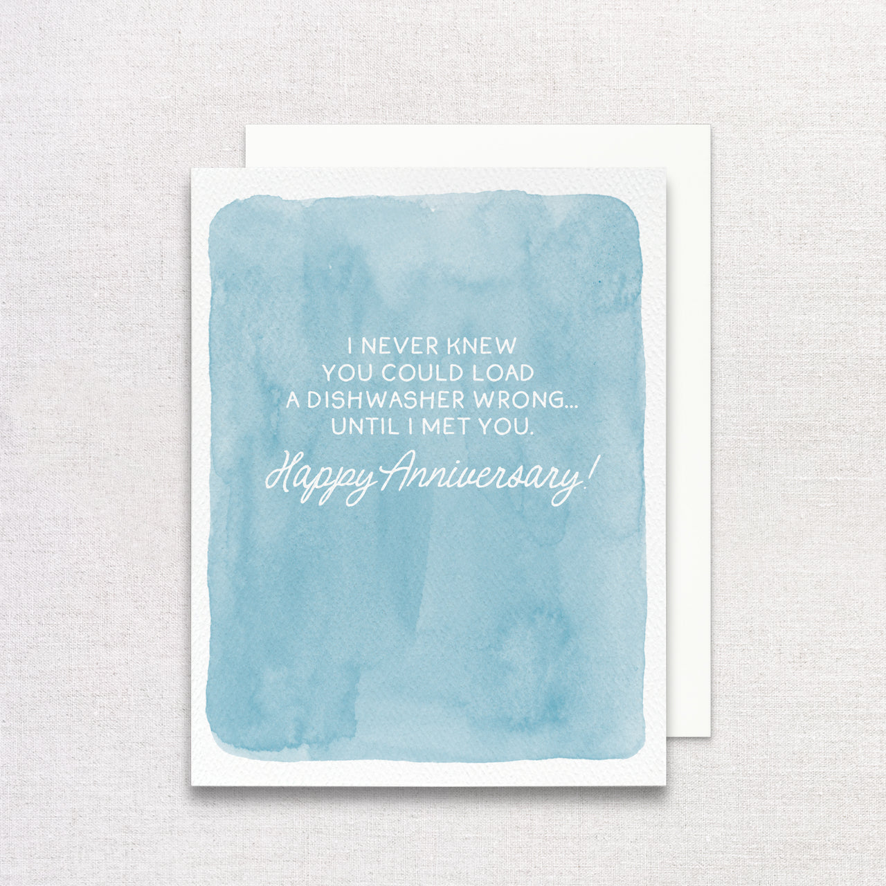 Blue watercolor card with white text