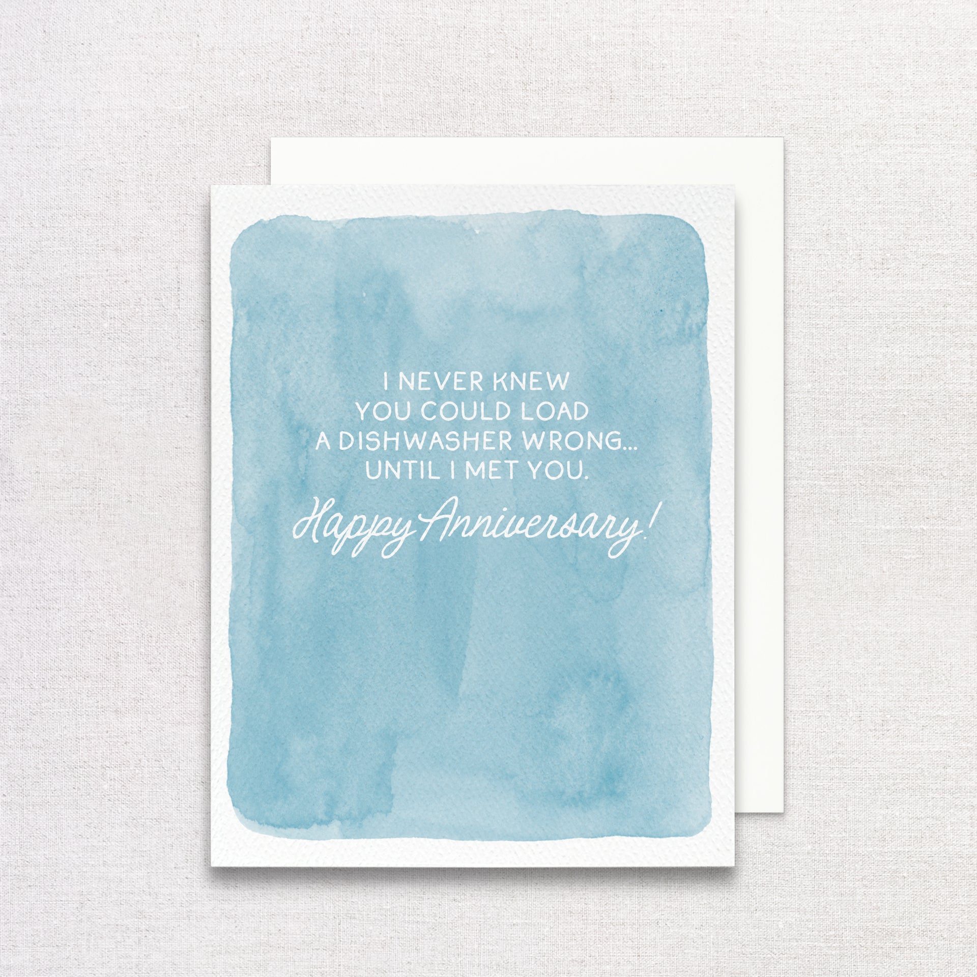 Blue watercolor card with white text