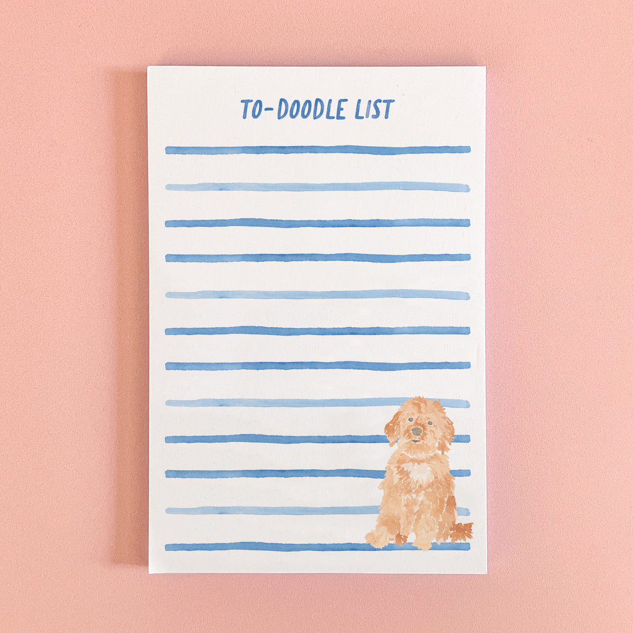 Notepad with a watercolor painted goldendoodle and the phrase to-doodle list