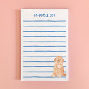 Notepad with a watercolor painted goldendoodle and the phrase to-doodle list