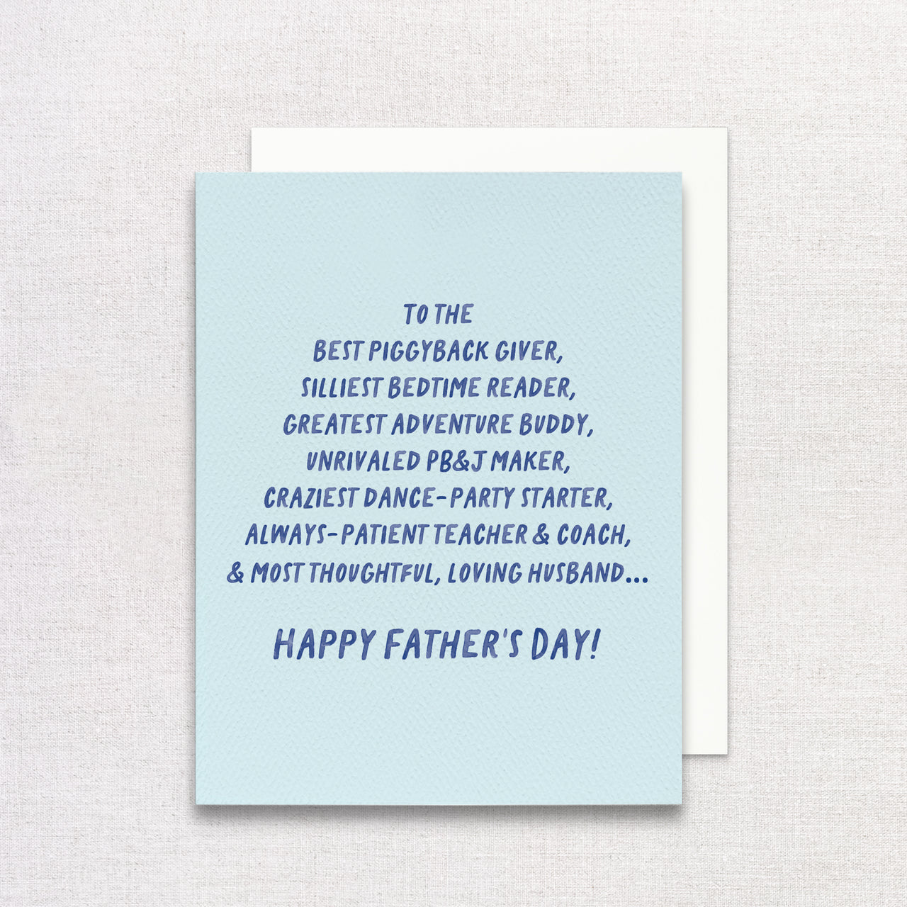 Father's Day card for husband with blue text on a light blue background