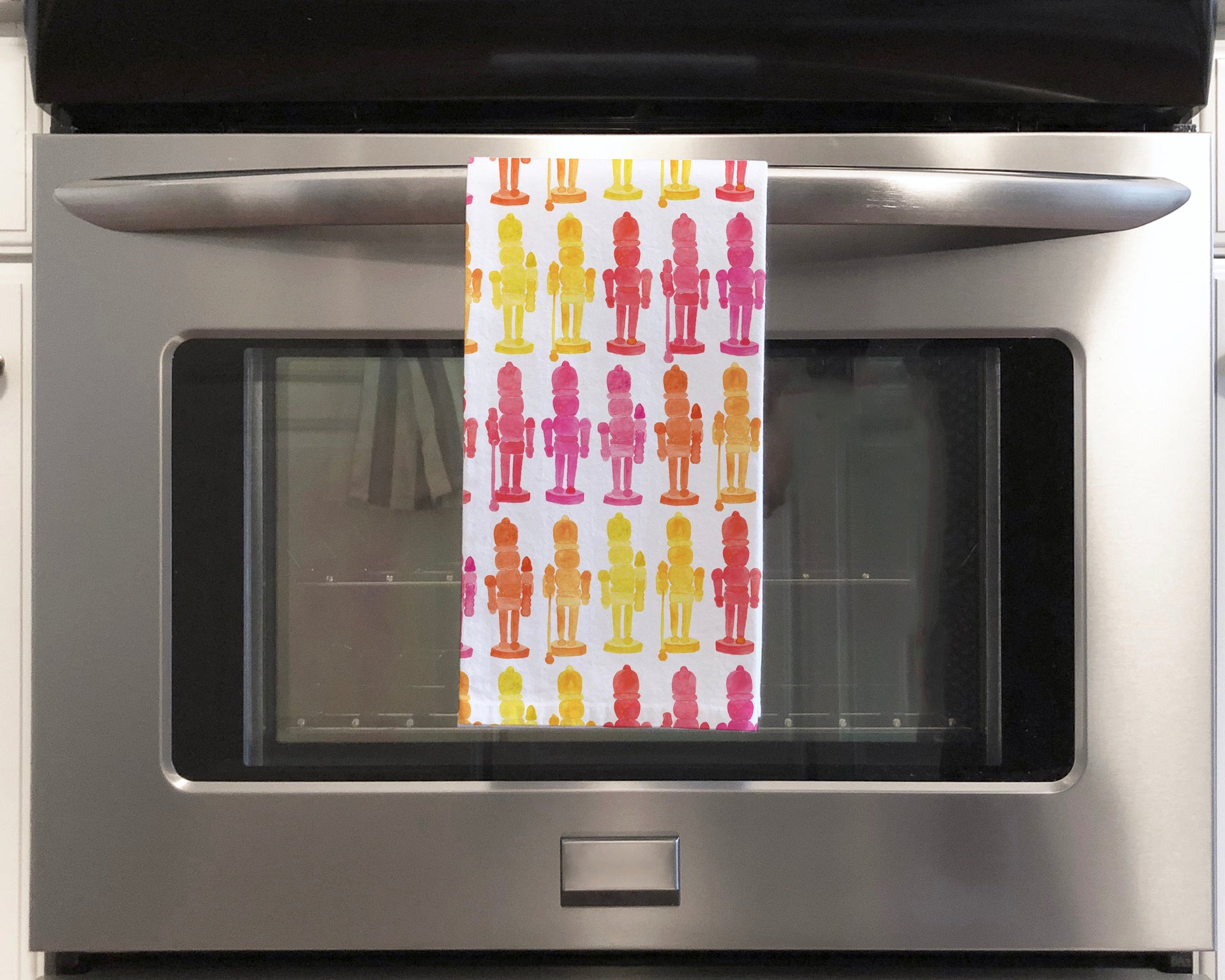 Colorful Nutcrackers Holiday Tea Towel by Gert & Co