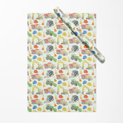 Gift wrap with construction vehicle pattern on a white background