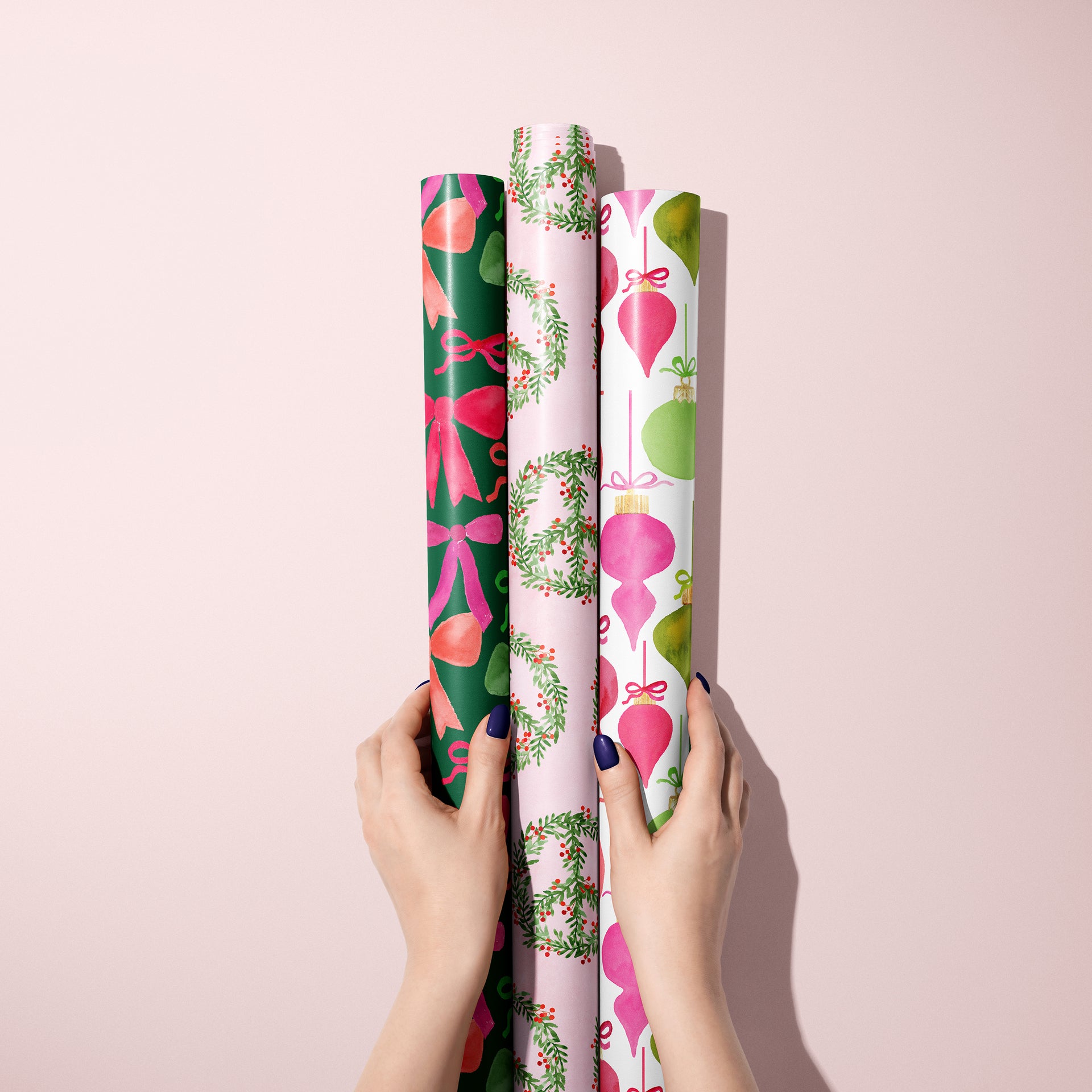 Holiday Gift Wrap Rolls with Hands