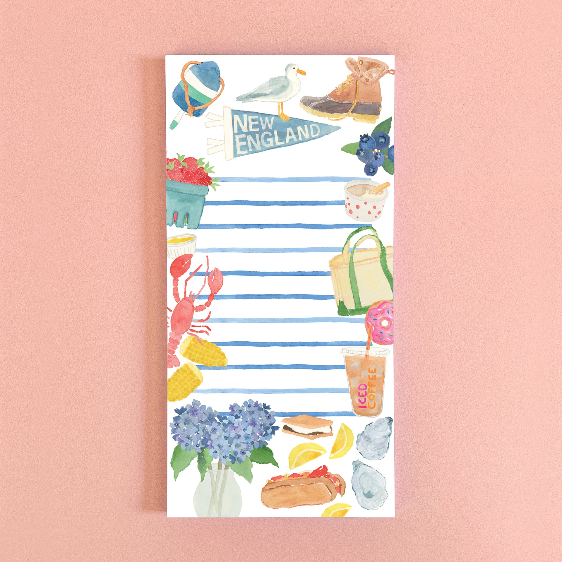 Notepad with New England-themed illustrations on a white background