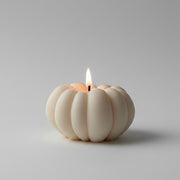 Cream pumpkin shaped candle