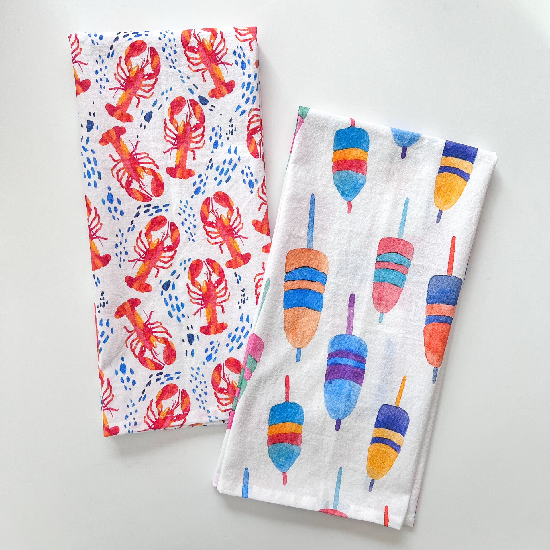 Colorful Buoys Tea Towel and Lobsters Tea Towel by Gert & Co